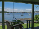 Porch views of one of the prettiest working harbors in Maine. Sit on the porch swing and relax the day away